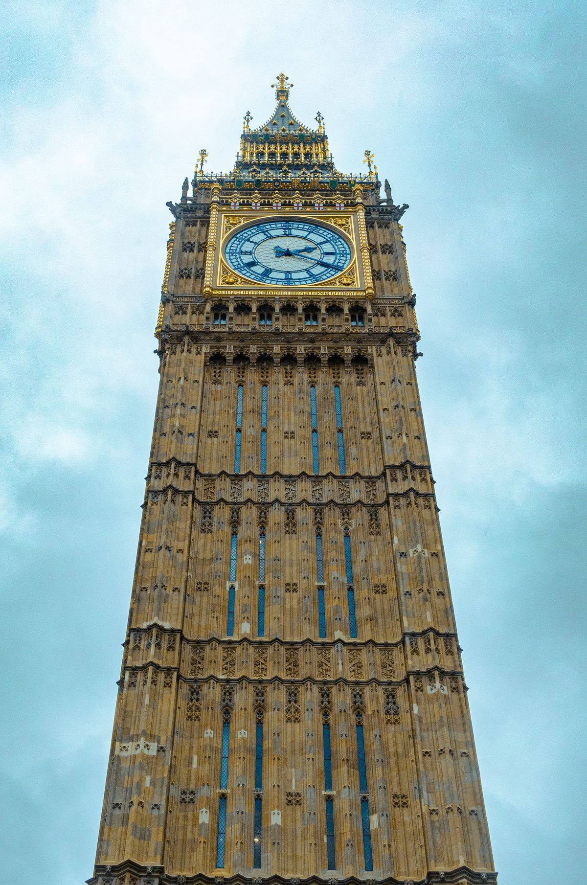 The Elizabeth Tower clock face of Big Ben seen from below